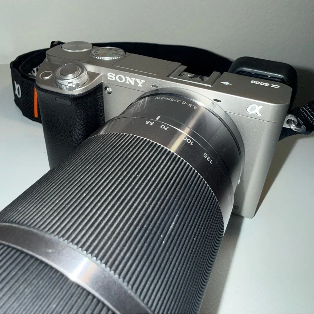Sony a6000 - 24.3 MP Mirrorless Camera Body & 55‑210mm OSS Lens - Silver